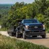 A 2023 Ford F-450 XL Super Duty w/ Max towing trailering capability on display