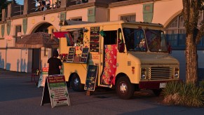 A taco truck parked down town