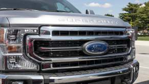 Ford grille on a silver, Super Duty pickup truck
